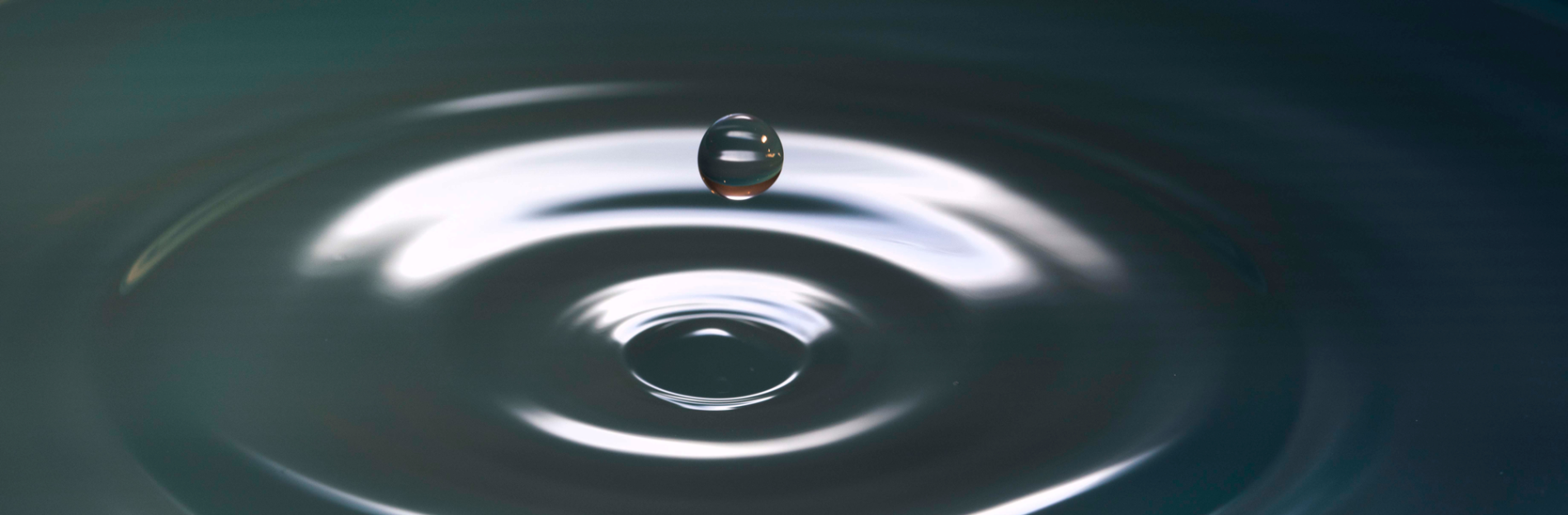 A drop of water from a leaky faucet